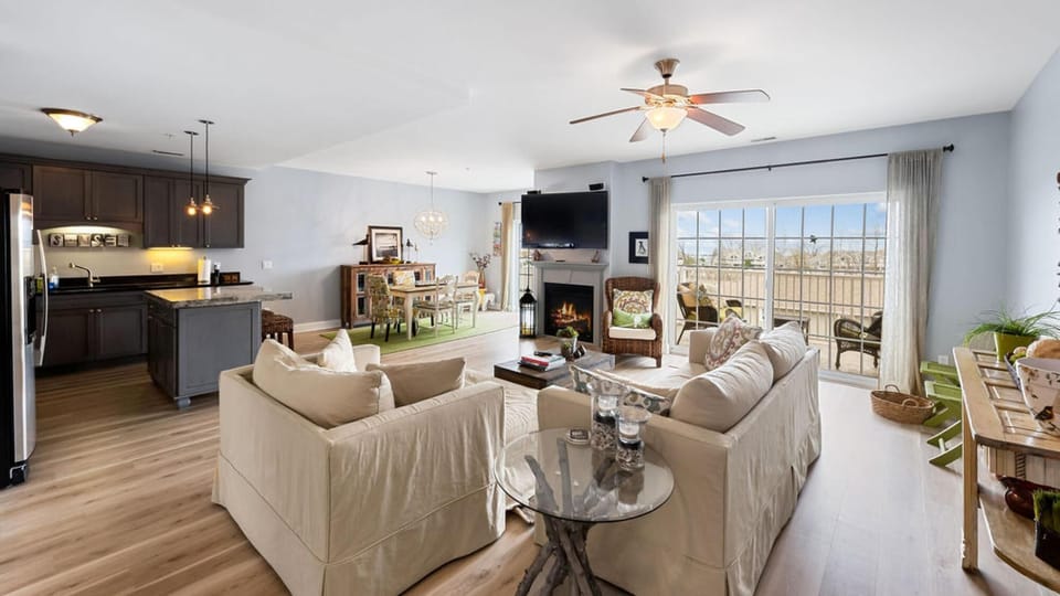 Spacious living room with fireplace and panormic views