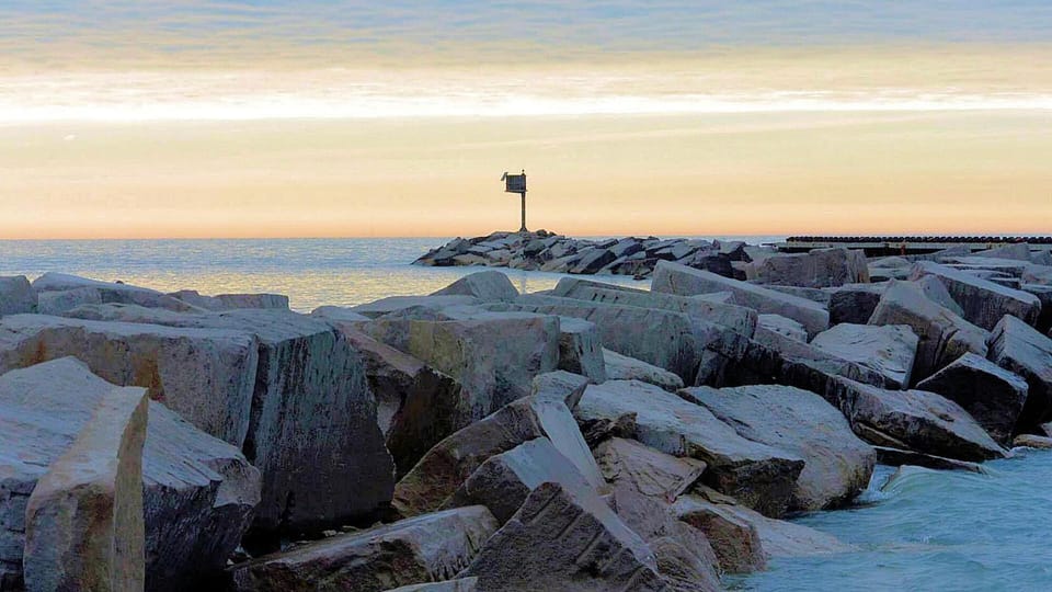 New Buffalo refuge harbor breakwater at sunset