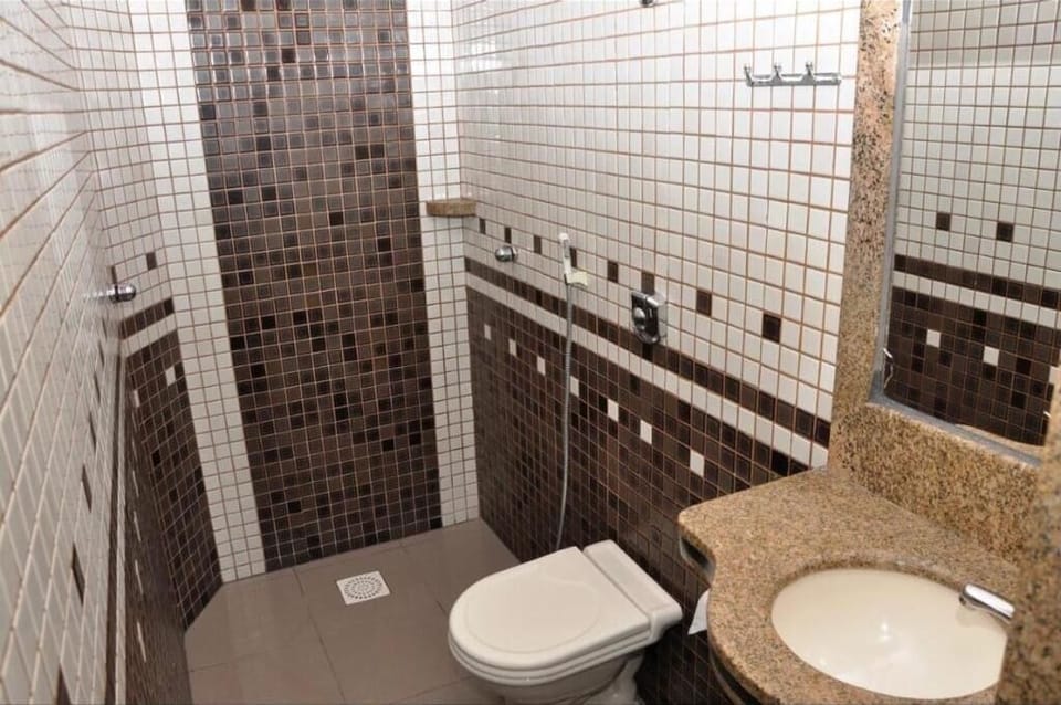 Shower, rainfall showerhead, towels