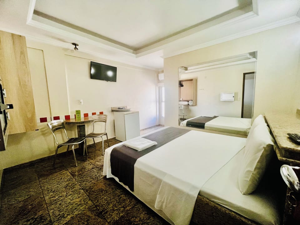 Economy Double Room | Minibar, WiFi (free), bed sheets