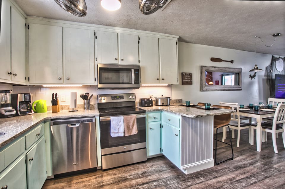 Full kitchen and the freezer has an ice maker to fill up the cooler