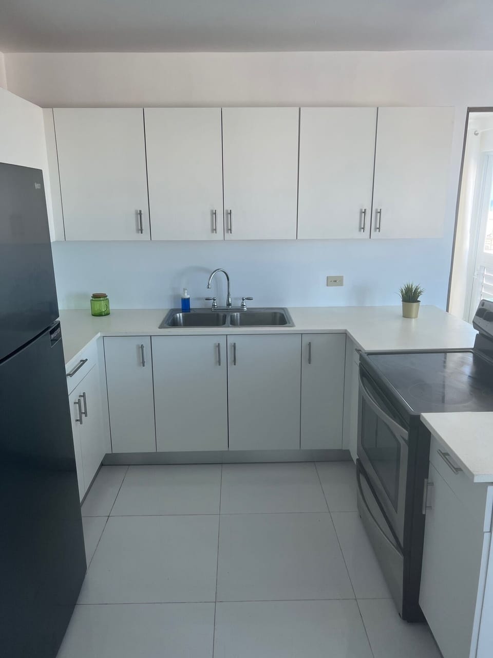 Fridge, microwave, cookware/dishes/utensils