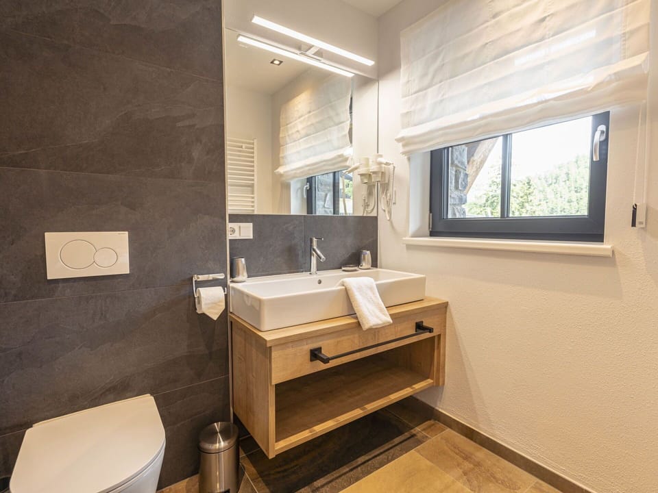 Tap, Property, Sink, Mirror, Plumbing Fixture, Window, Bathroom Sink, Building, Wood, Interior Design