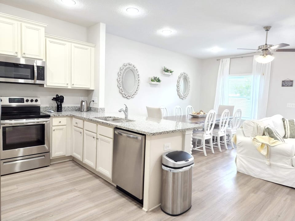 Large open kitchen, dining and living room space.