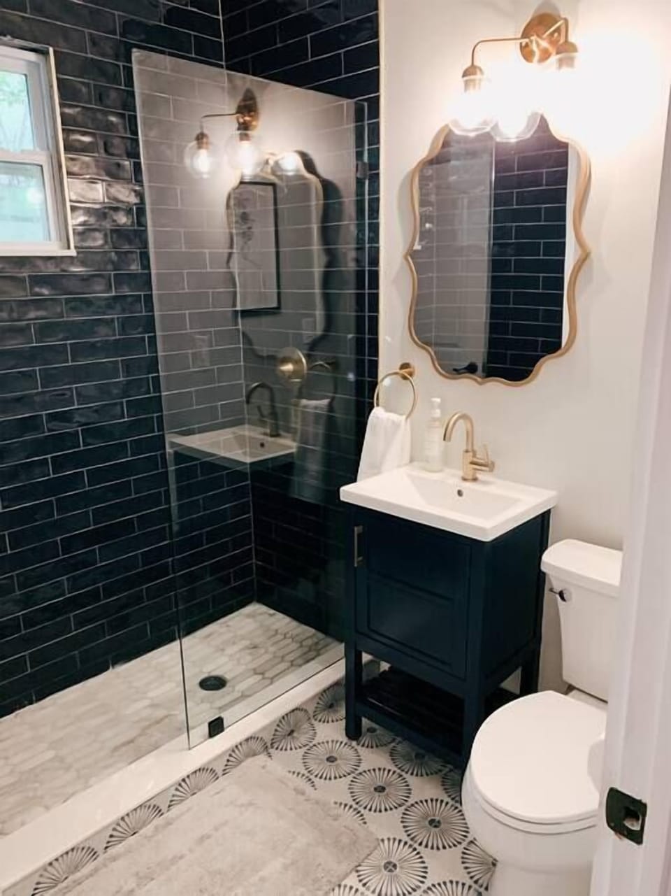 Does it get any cuter than this moody bathroom? Fully stocked with soaps, shampoo/conditioner, toilet paper, towels & a hair dryer.