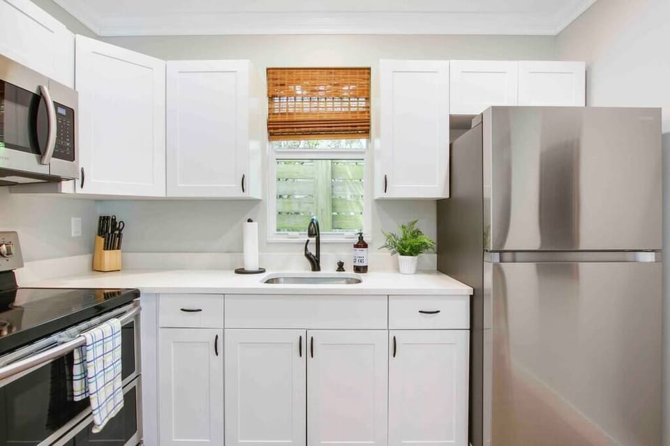 Adorable fully stocked kitchen so you can stay home and cook if you please!