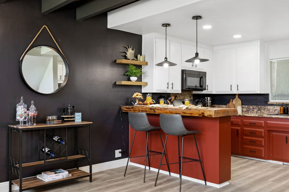 Additional seating at the kitchen bar.