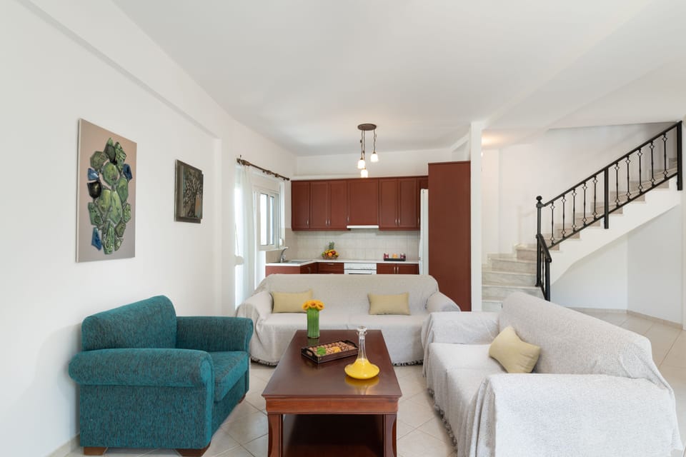 Comfort Duplex | Living area | 32-inch flat-screen TV with cable channels, TV, fireplace