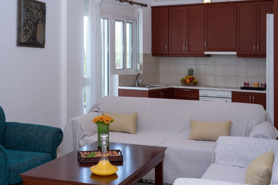Comfort Duplex | Living area | 32-inch flat-screen TV with cable channels, TV, fireplace