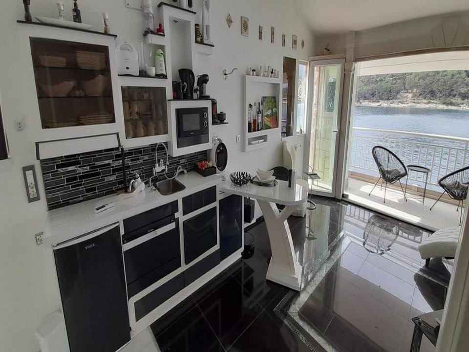 Apartment (One Bedroom Apartment with Balcony an) | Private kitchen | Fridge