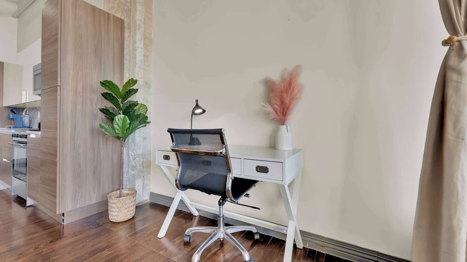 Workspace Oasis: Bright desk with stylish decor, perfect for productivity in trendy Dallas!