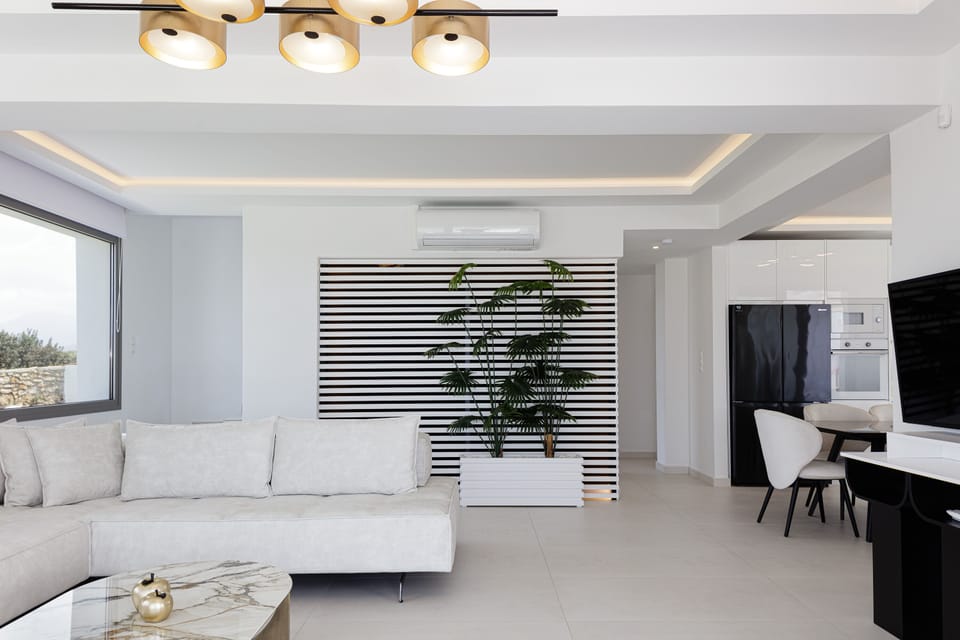 The living room is bright and filled with natural materials.