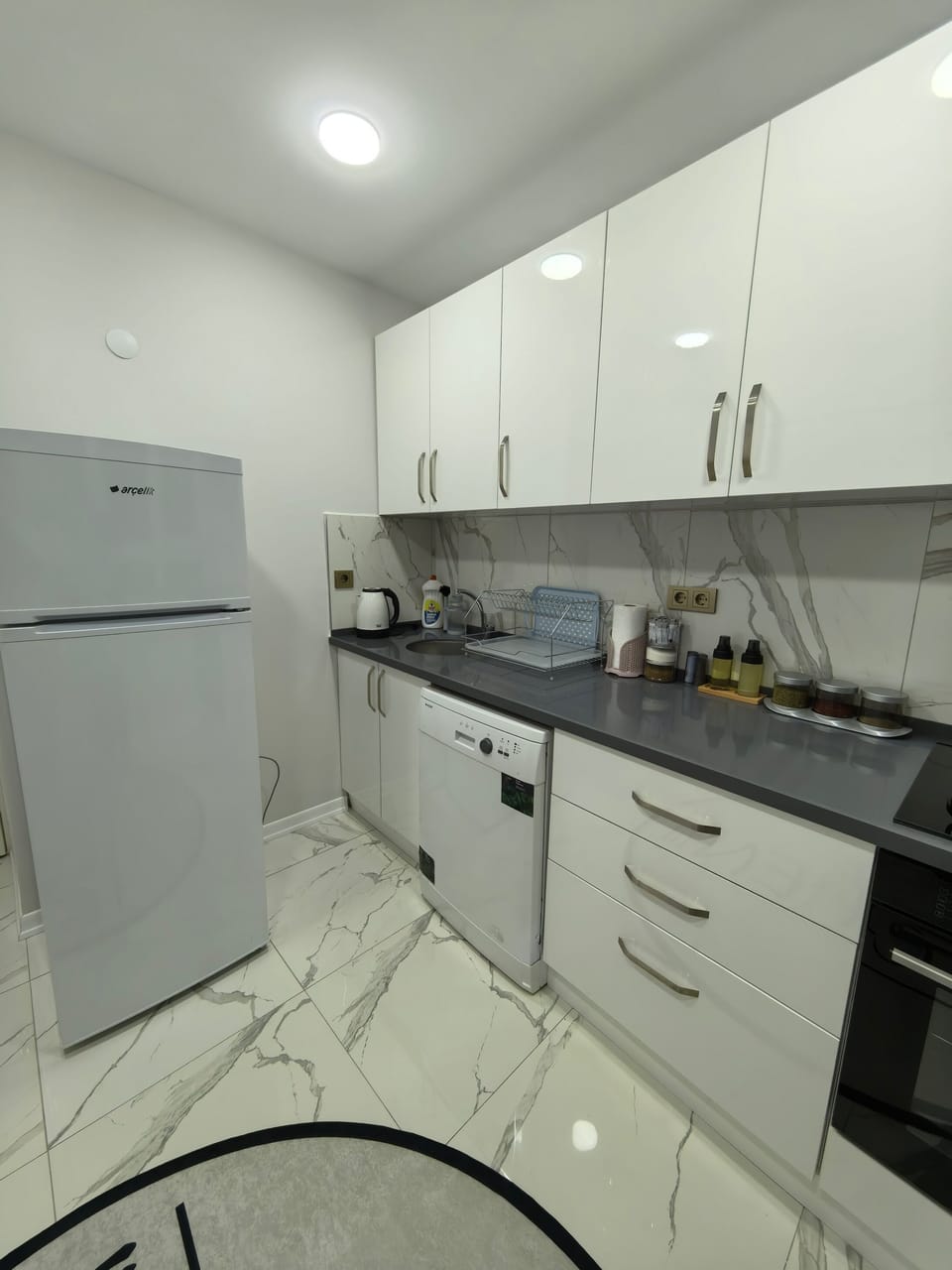 Luxury Apartment | Living area | Flat-screen TV