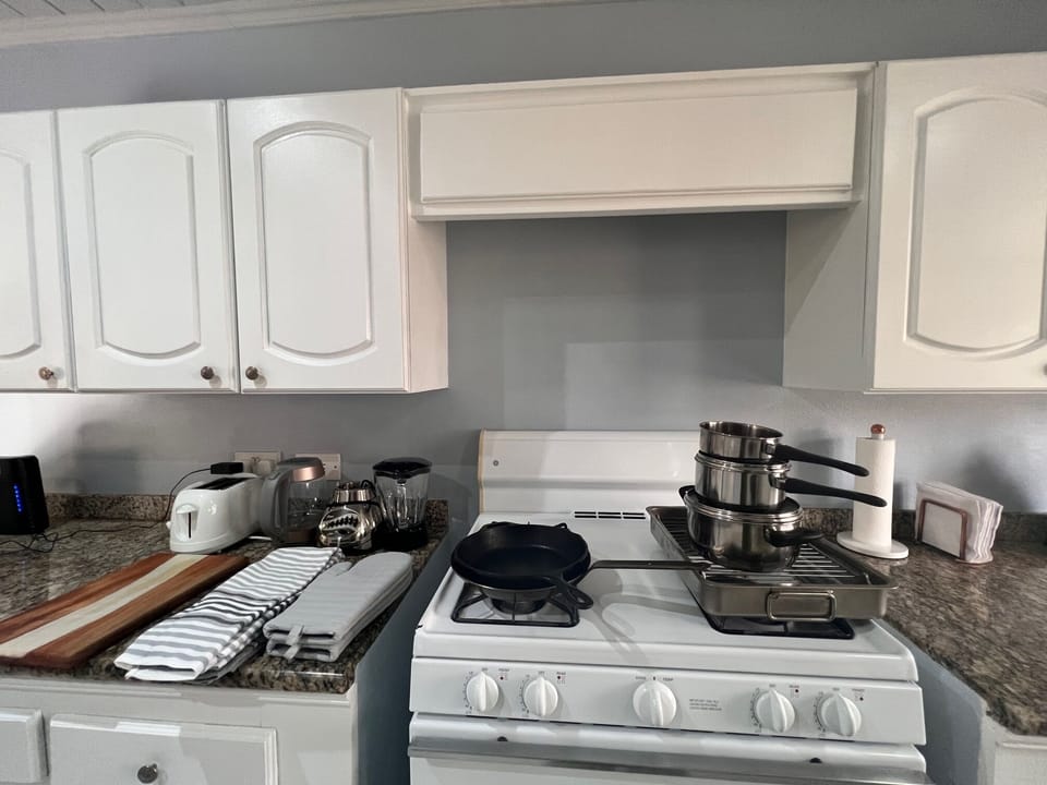 Kitchen will essential equipment, pots, pans  and utensils 