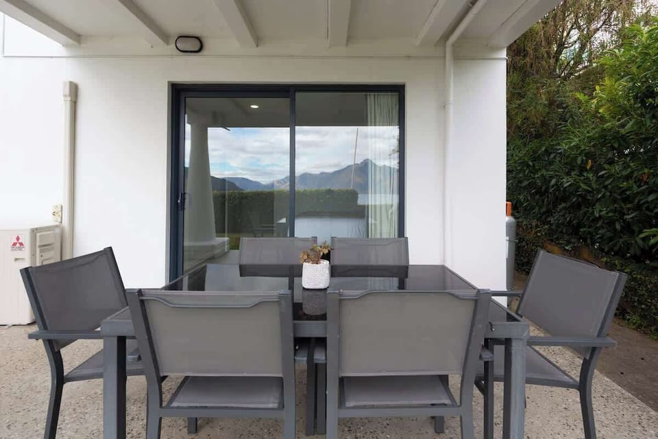 Secluded Outdoor Oasis: Relax in the private garden patio, perfect for morning coffee or evening drinks amidst lush greenery and fresh mountain air.
