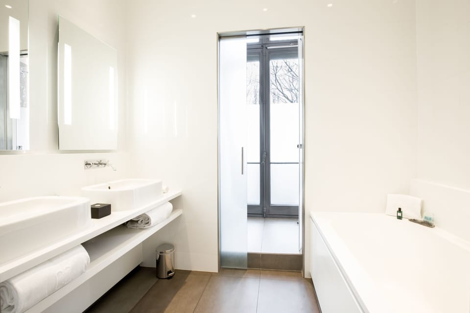 Prestige Room | Bathroom | Designer toiletries, hair dryer, bathrobes, slippers