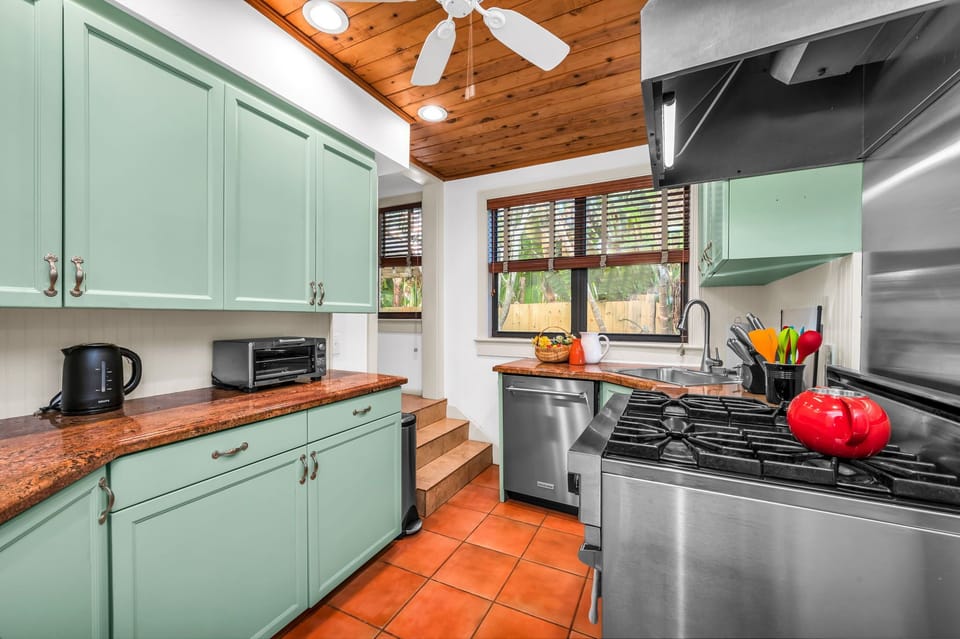 The Kitchen is brightly painted and a pleasure to cook in. It has everything you need to create a fabulous home-cooked meal for family or friends. There is a gas range, stainless steel stove and oven, Keurig, kettle, and blender.