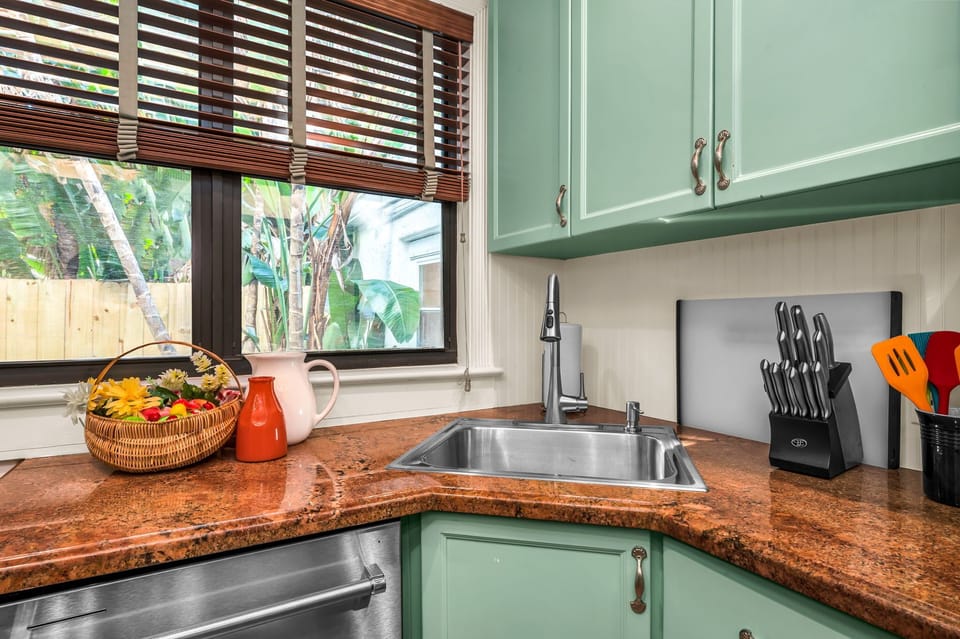 The Kitchen is brightly painted and a pleasure to cook in. It has everything you need to create a fabulous home-cooked meal for family or friends. There is a gas range, stainless steel stove and oven, Keurig, kettle, and blender.