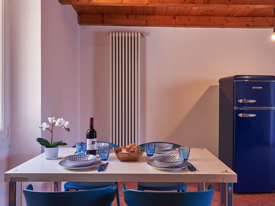 Table, Furniture, Property, Building, Tableware, Blue, Azure, Cabinetry, Wood, Shelving