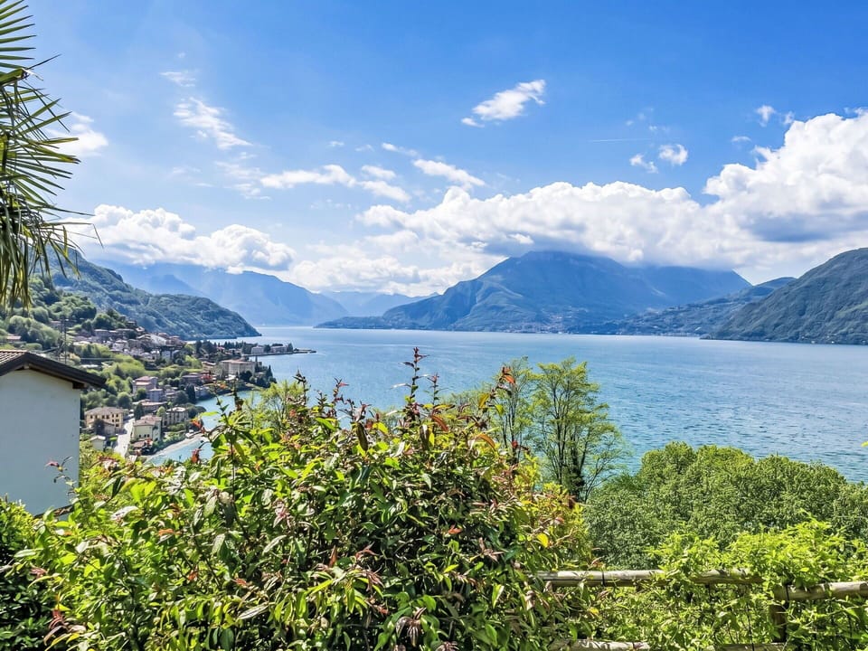 Mountain, Blue, Mountainous Landforms, Body Of Water, Hill, Natural Landscape, Mountain Range, Highland, Coast, Coastal And Oceanic Landforms