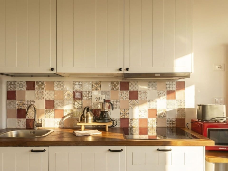 Kitchen, Flooring, Interior Design, Cabinetry, Countertop, Cupboard, Kitchen Appliance, Tile, Drawer, Wood Stain