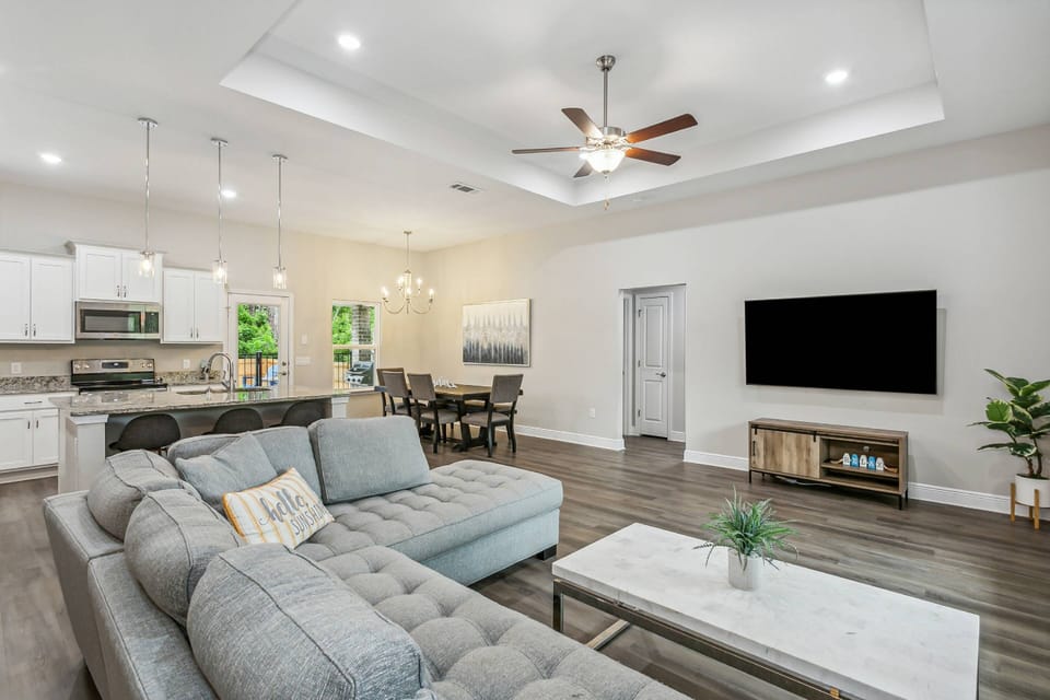 Spacious Living Room With huge 70" Smart TV