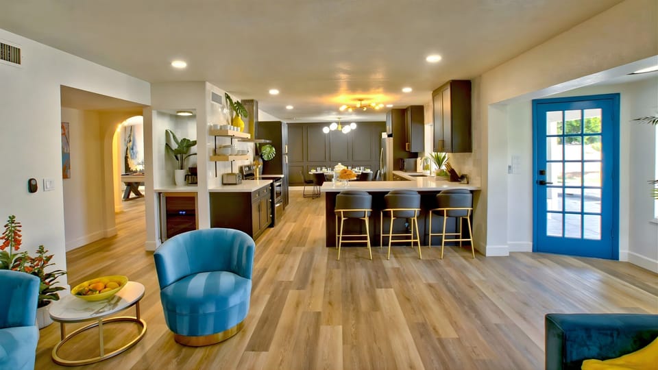 Large chef’s kitchen with peninsula bar for three