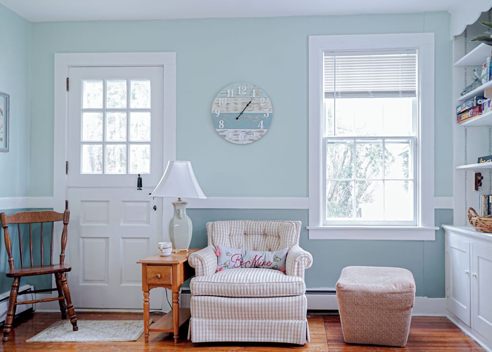 Cozy reading nook with gentle natural light.