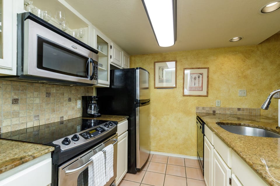 Your fully equipped kitchen makes meal prep a breeze with granite counters, stainless appliances, and all cooking essentials ready for your stay.