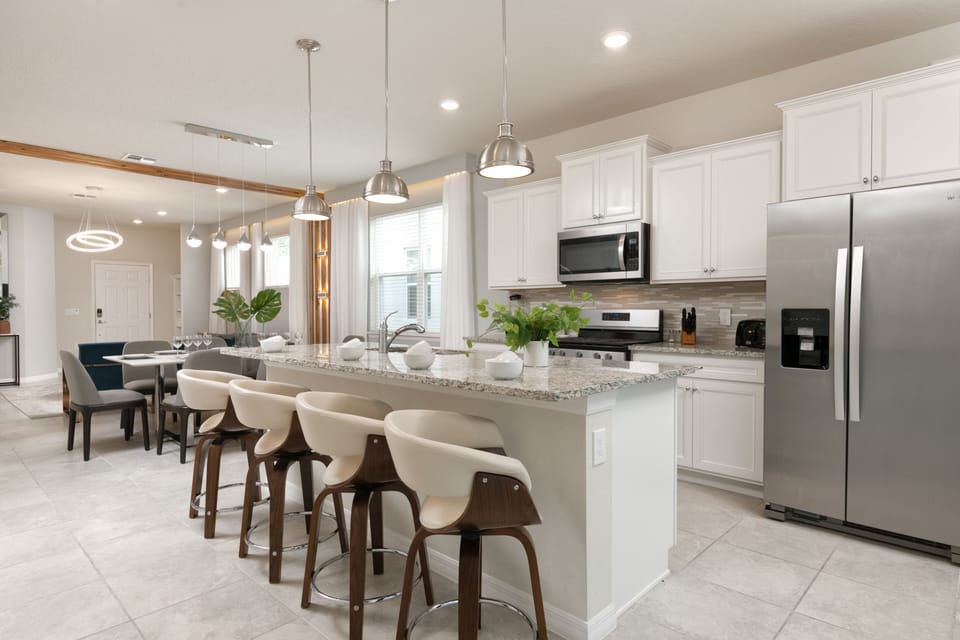 This kitchen is made for those who don't want to miss a moment in a group.