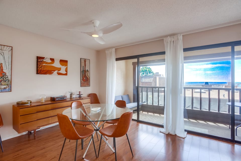 Large dining area with partial ocean views.