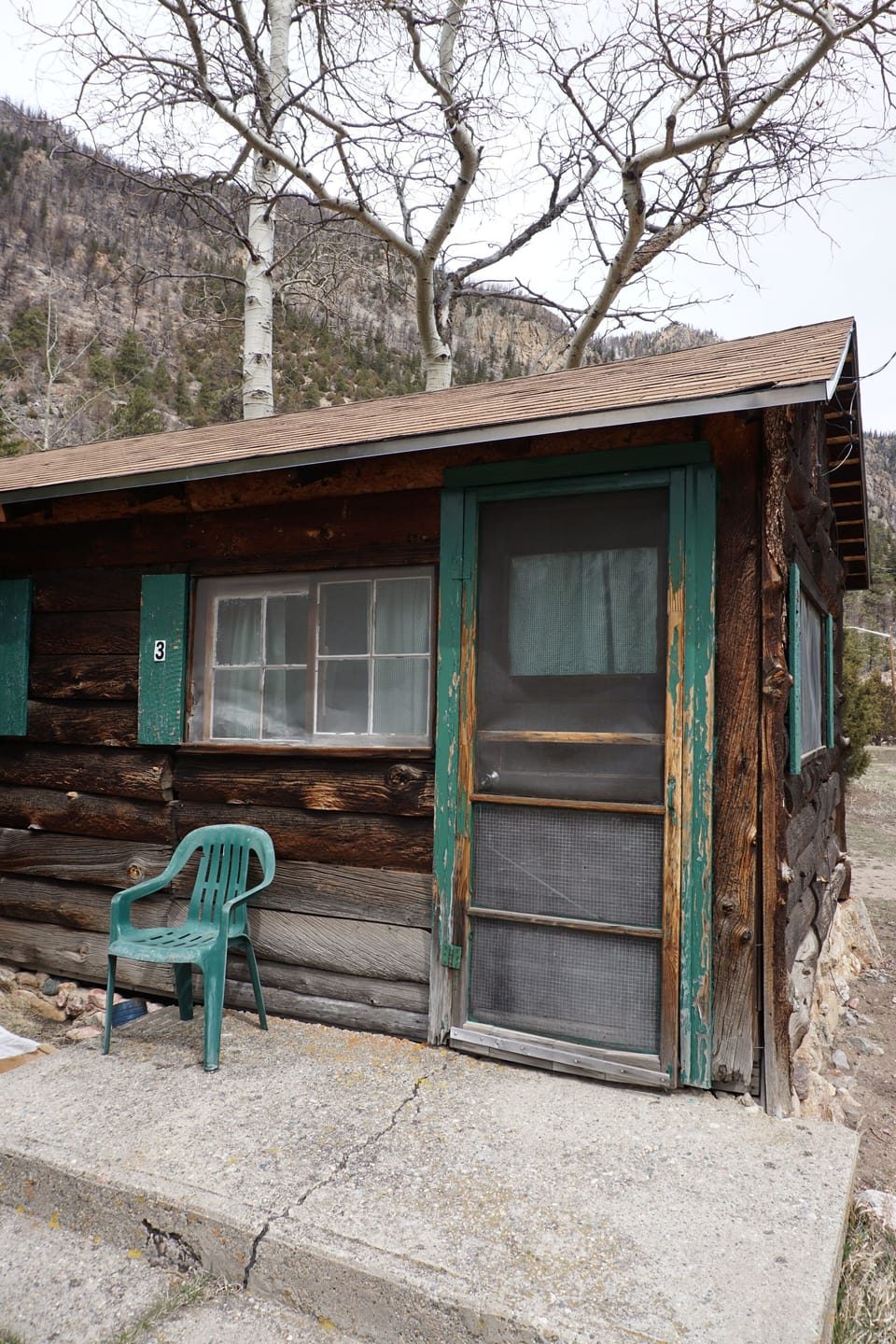 Cabin 3 has a small deck, and has a picnic table just outside.
