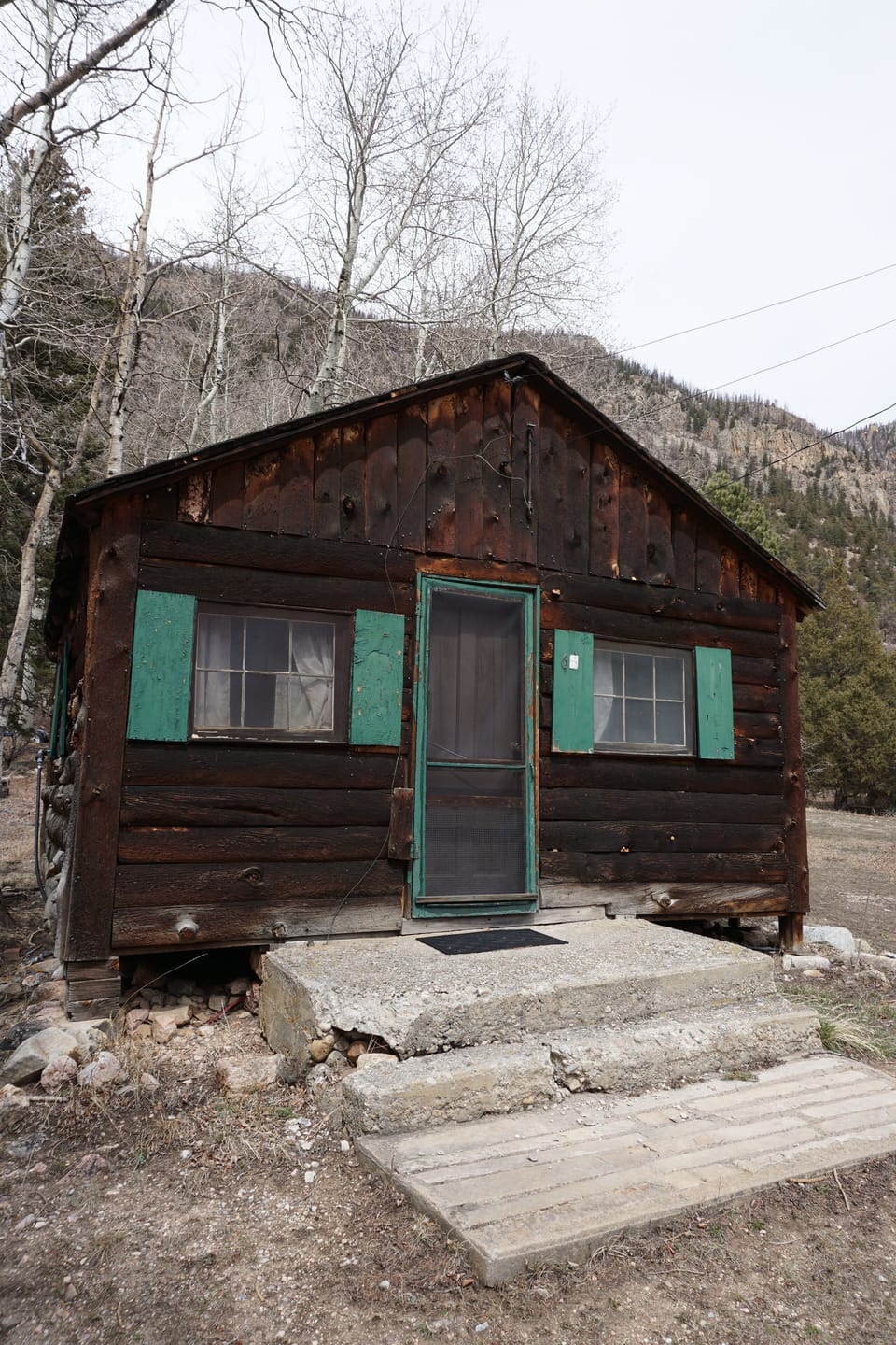 Cabin 6 has a small deck, and has a picnic table just outside.