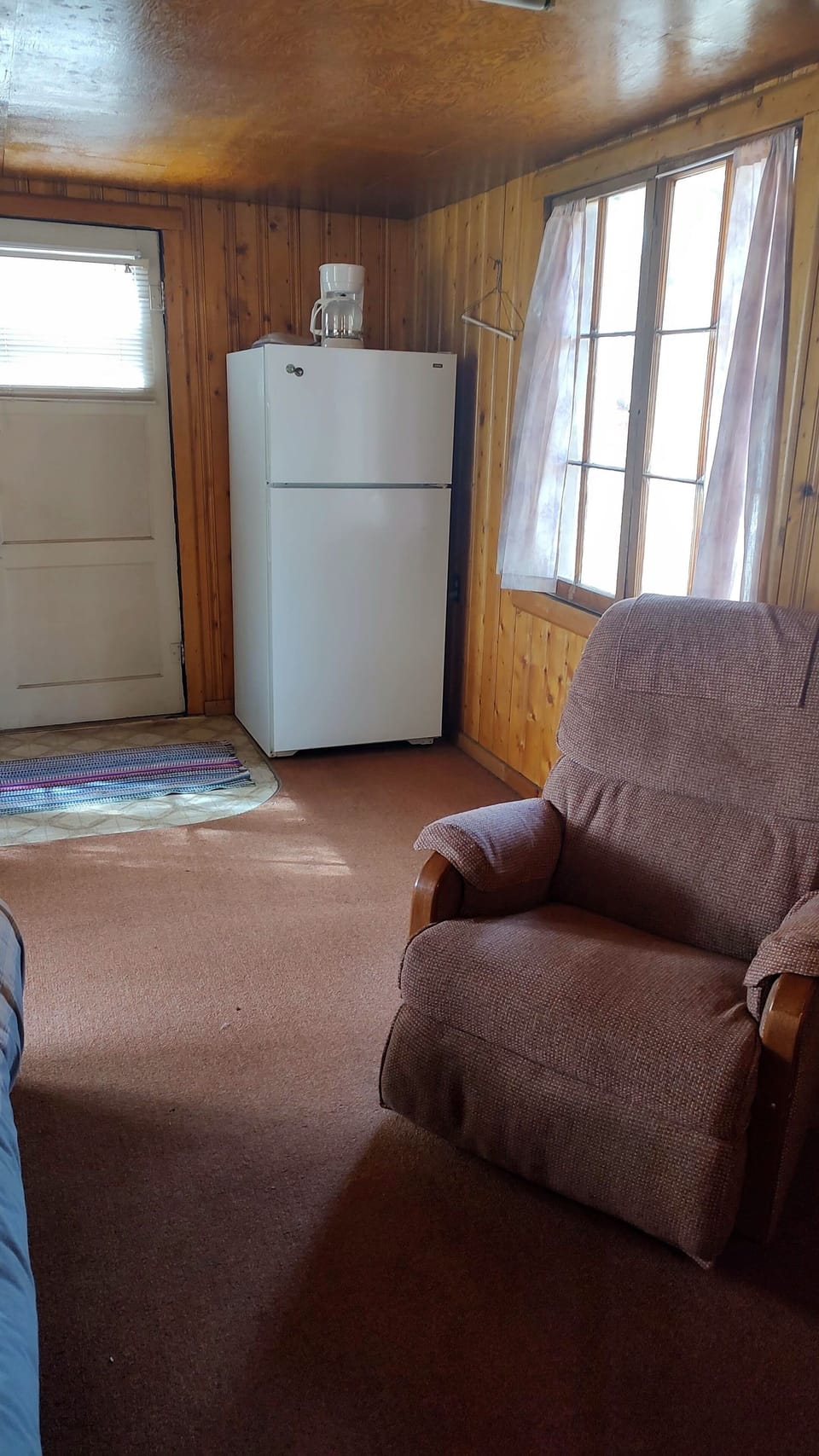 Cabin 11 features two recliners and a full size fridge.