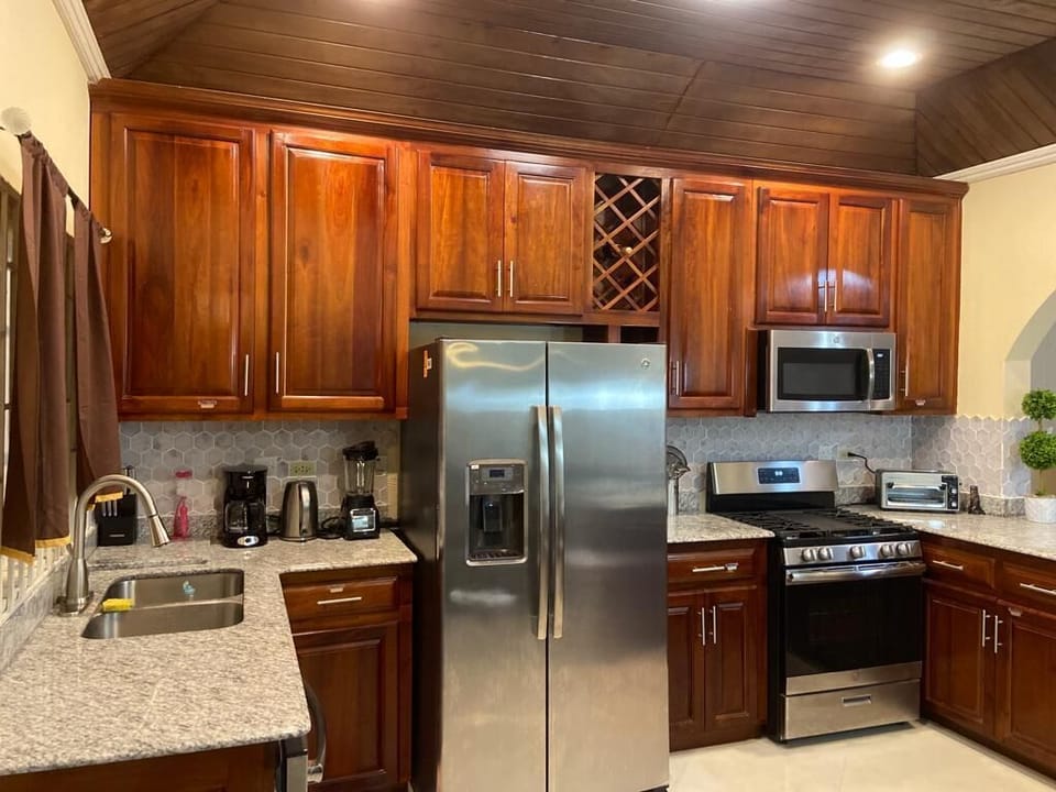 Kitchen: 5 burner gas stove, dish washer, microwave, toaster, coffee maker… 
