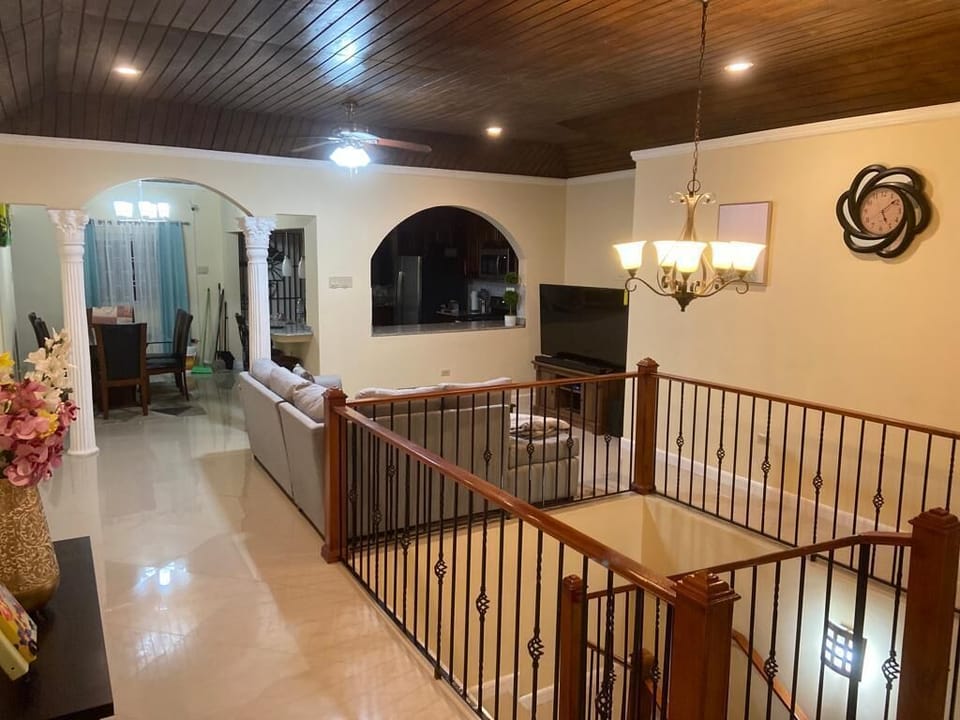 View of living room , dining, and kitchen.