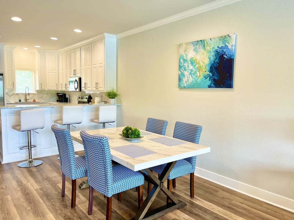 Gather around the lovely dining area to enjoy your favorite meals.