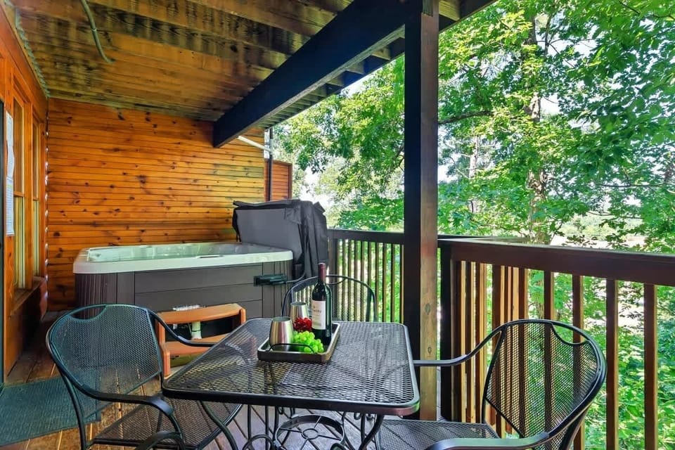 Soak, sip, relax! Your balcony hot tub and comfy chairs are ready for some Smoky Mountain unwinding.