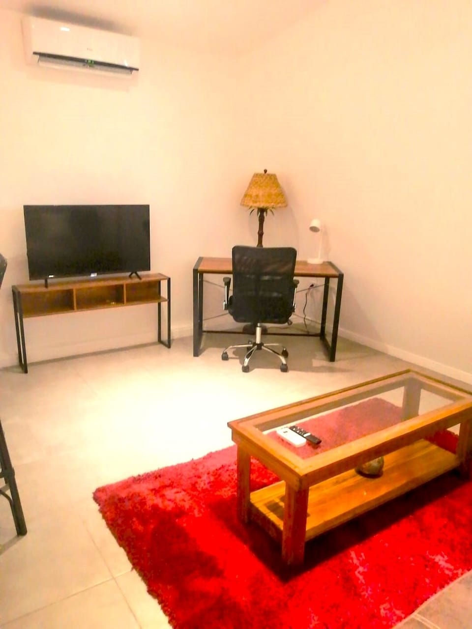 Living Area configured with workstation in corner