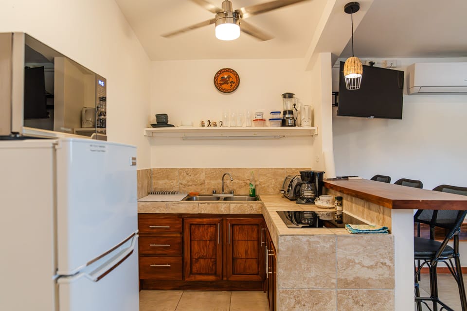 Kitchen open to main living area. 