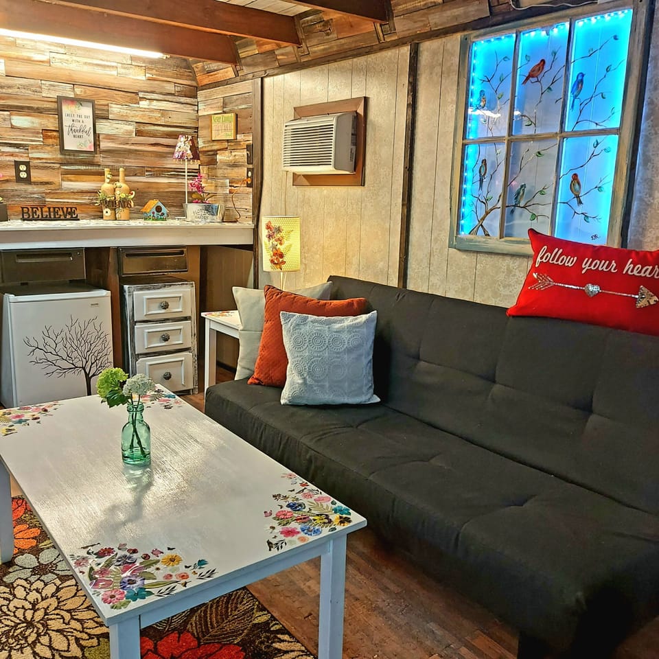 She Shed Futon, and AC, LED, lit up hand painted antique window