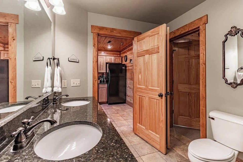 Our downstairs full bathroom with two sinks for getting ready in the morning!