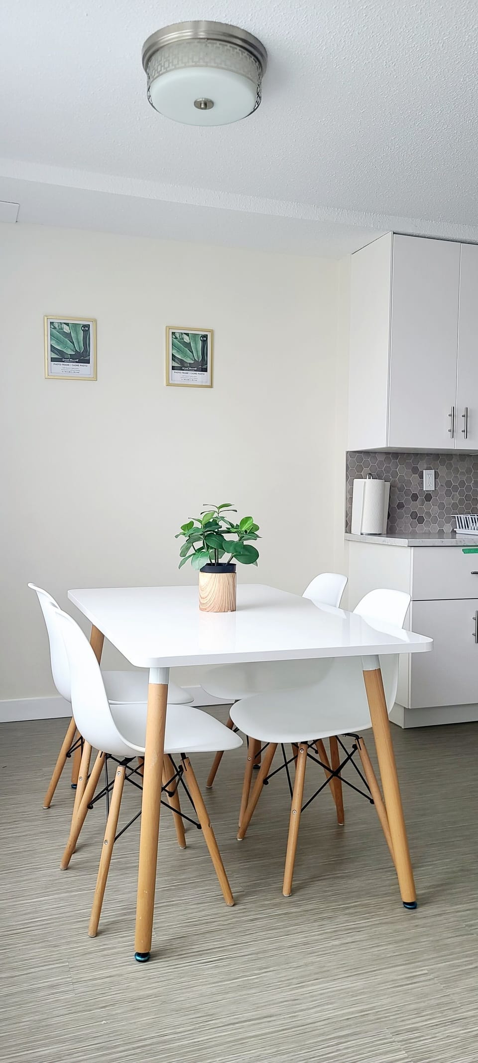 The dining room opens up to the living space right next to the balcony door.
