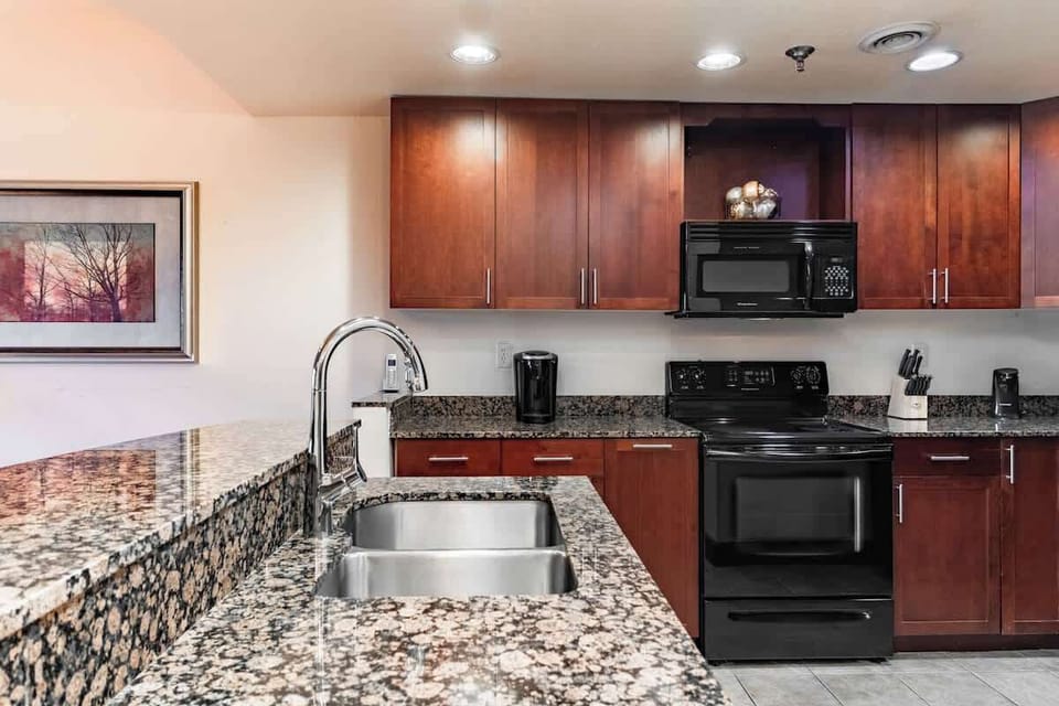 Our kitchen has plenty of space and all the essentials you need to prepare a home-cooked meal or to store your snacks throughout your stay!