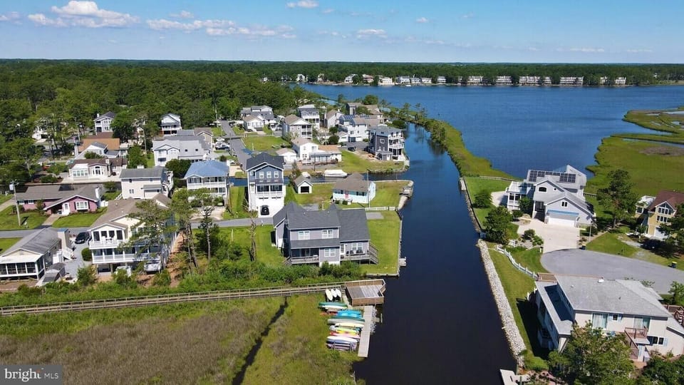 Stewards Watch - Bayside Community Aerial - A stunning bird’s-eye perspective showcasing the community’s unique location along the winding salt marshes and tranquil bay waters.