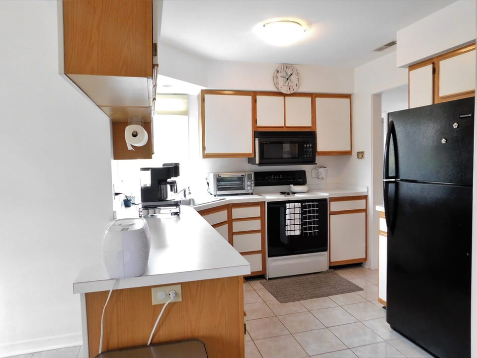 541D Hudson Avenue - Kitchen Perspective - Emphasizes the open connection between the kitchen and the main living areas, allowing the chef to remain part of the conversation.