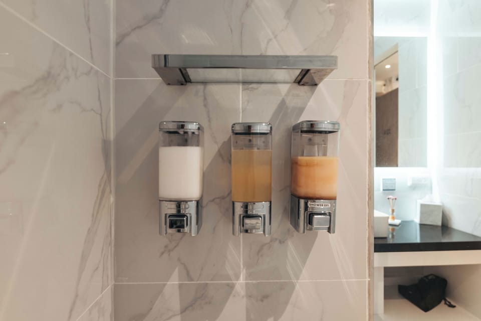Shower, eco-friendly toiletries, hair dryer, towels