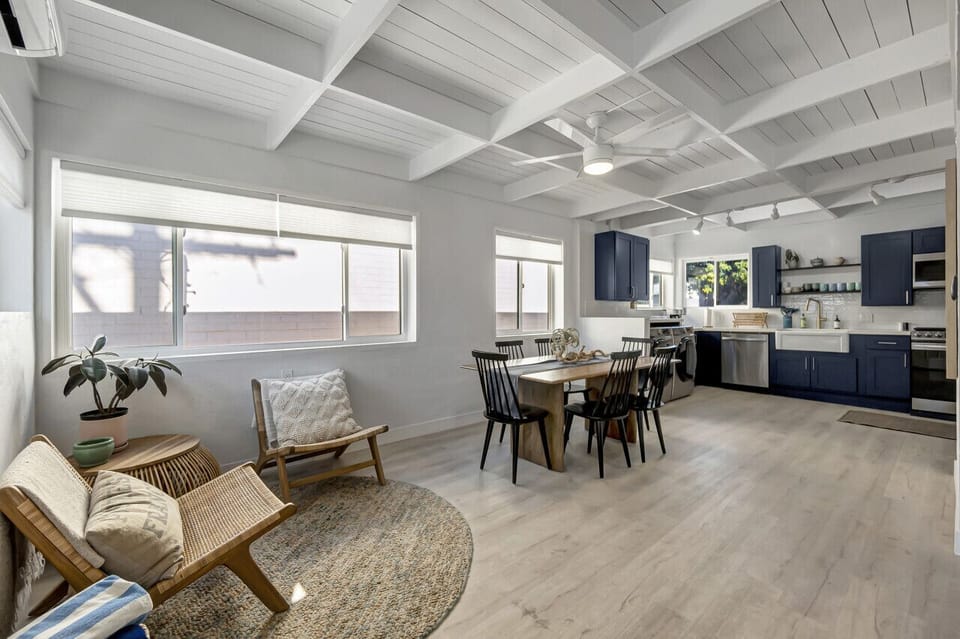 Light-filled living room w/ comfy seating & easy access to the dining space.