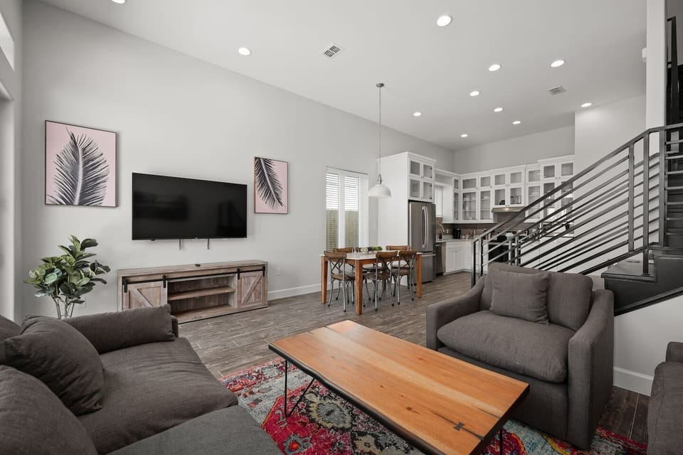 Spacious living area flowing seamlessly into kitchen and dining