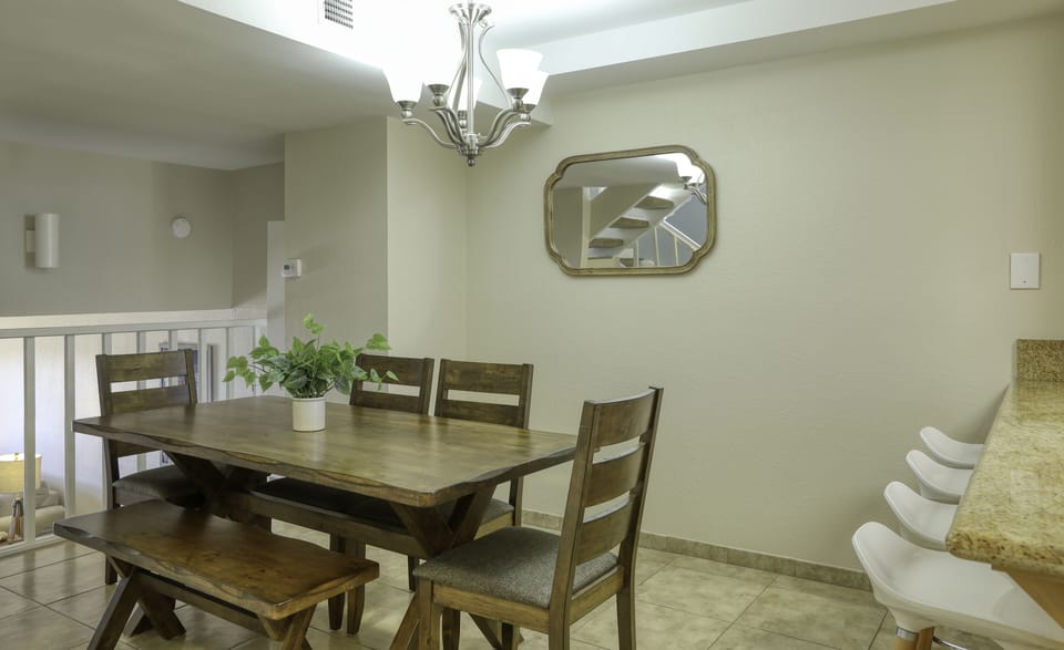 Extended table and chair set for family and friends to gather.